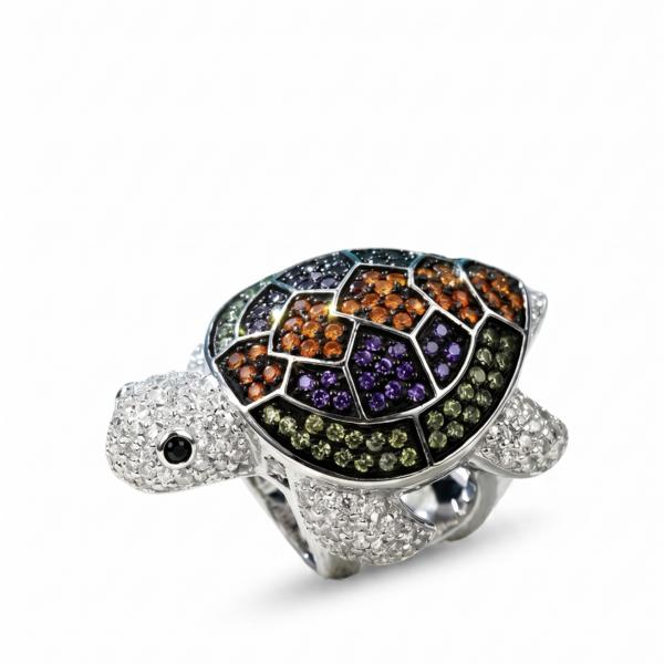 Anillo de plata de 1ª ley(925 milésimas) con terminación de blanco en forma de tortuga marina 