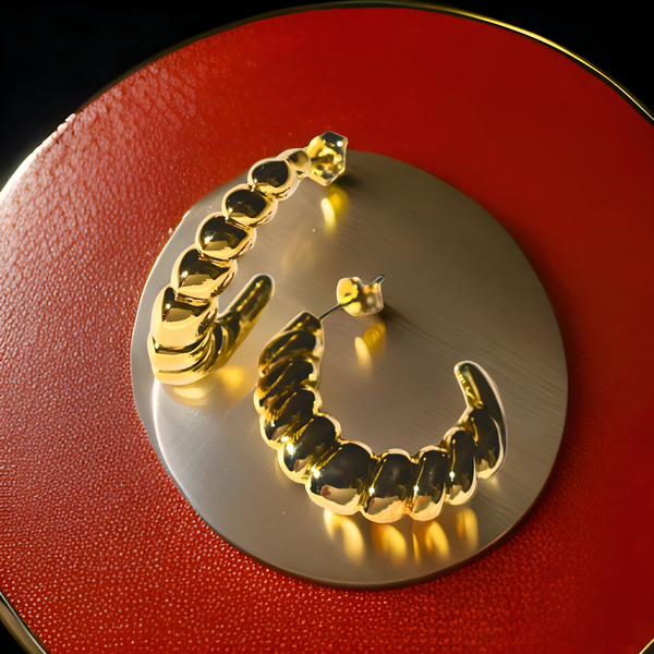 Pendientes de plata de 1ª ley(925 milésimas) chapados en oro amarillo de 1ª ley(750 milésimas) en forma de aros