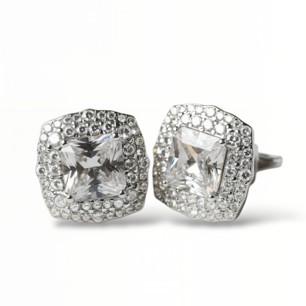 Pendientes de plata de 1ª ley(925 milésimas) con terminación de oro blanco en forma de roseta