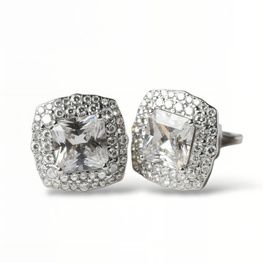 Pendientes de plata de 1ª ley(925 milésimas) con terminación de oro blanco en forma de roseta