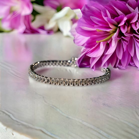 Pulsera rivière plata de 1ª ley(925 milésimas) con terminación de oro blanco 