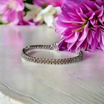 Pulsera rivière plata de 1ª ley(925 milésimas) con terminación de oro blanco 