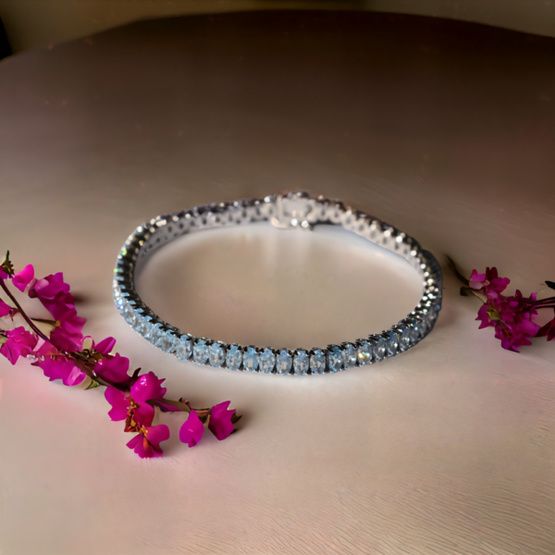 Pulsera rivière plata de 1ª ley(925 milésimas) con terminación de oro blanco 