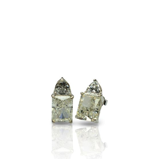 Pendientes de plata de 1ª ley(925 milésimas) con terminación de oro blanco y piedras en tonalidad diamante fancy