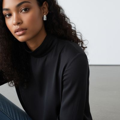 Pendientes de plata de 1ª ley(925 milésimas) con terminación de oro blanco y piedras en tonalidad diamante fancy