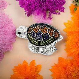 Anillo de plata de 1ª ley(925 milésimas) con terminación de blanco en forma de tortuga marina 